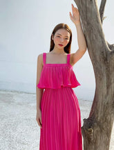 Pleated silk midi dress with ruffle overlay and wide straps for elegant summer occasions